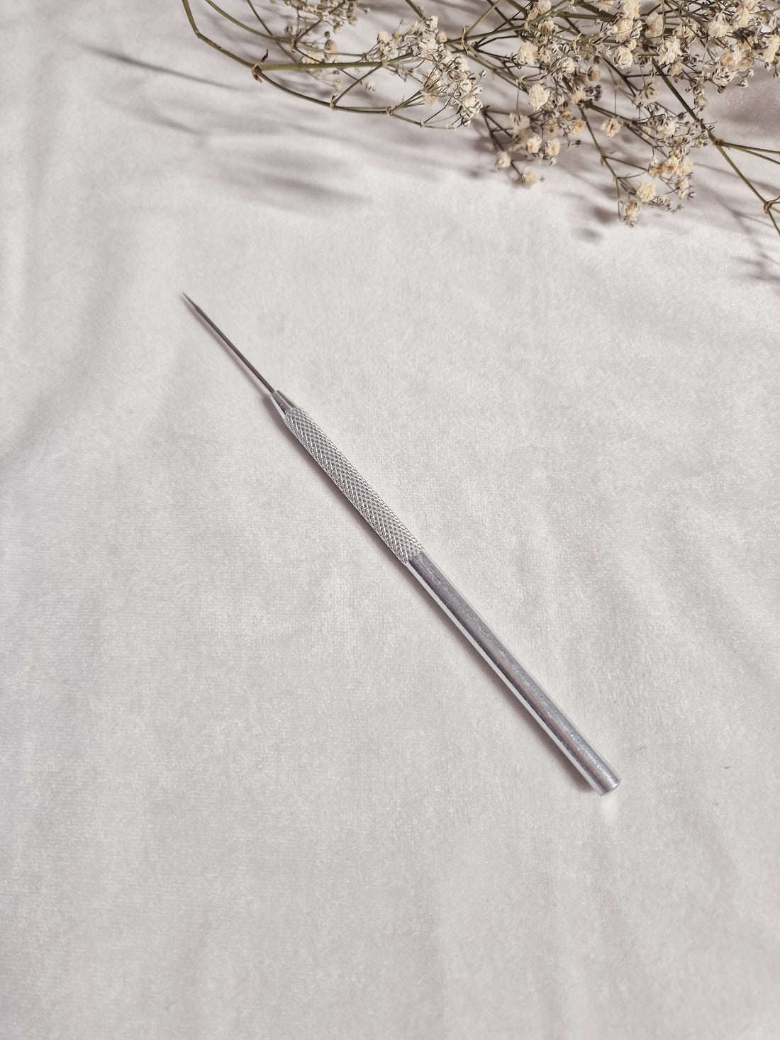 Needle tool